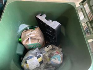 Bin about half full. Plastic is from new faucet install.