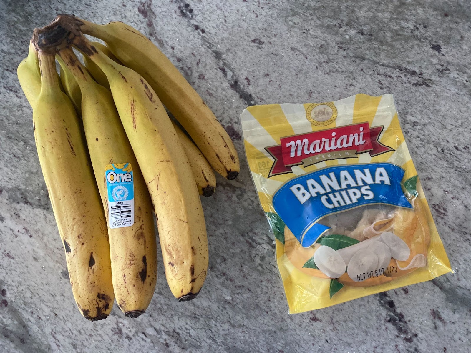 Photo of a chip bag and a bunch of bananas