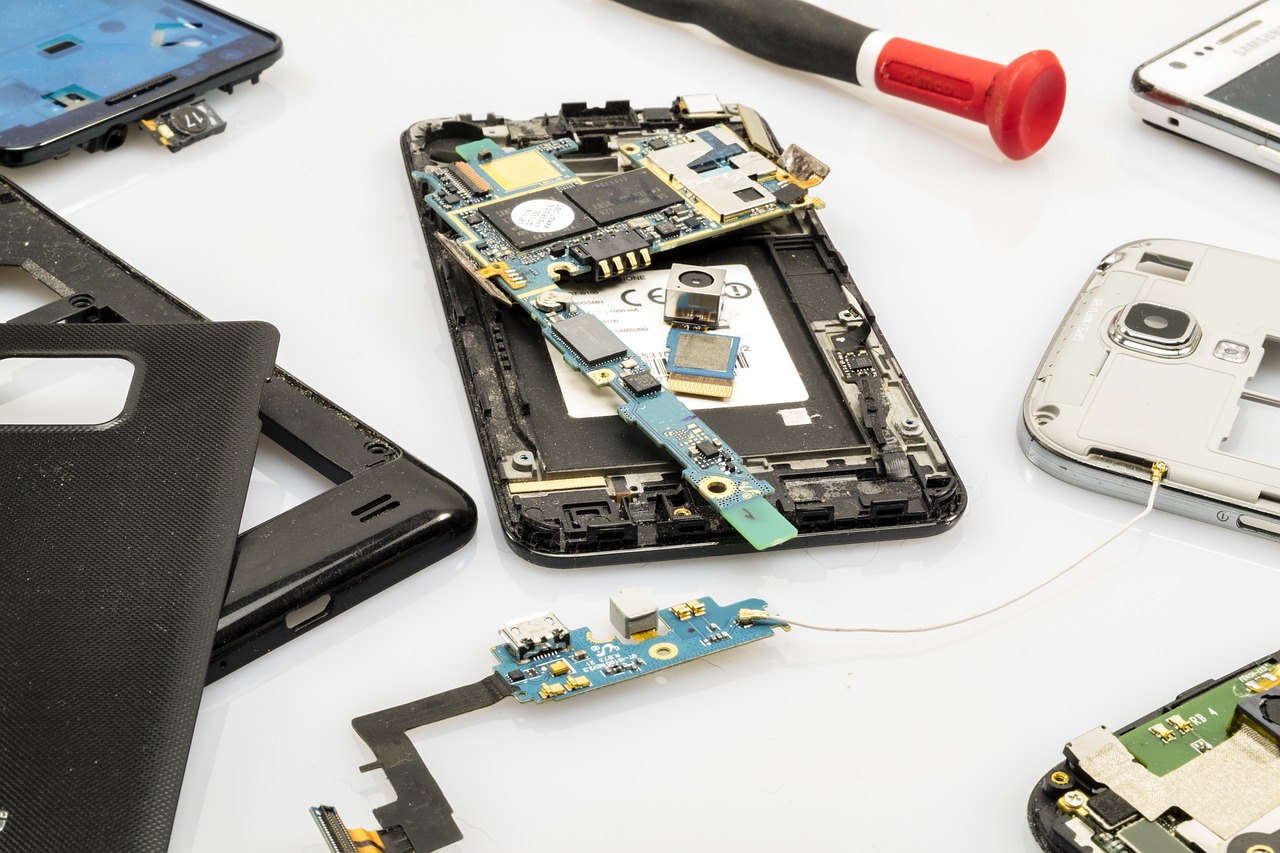 Photo of mobile phones with cases removed to show circuit boards