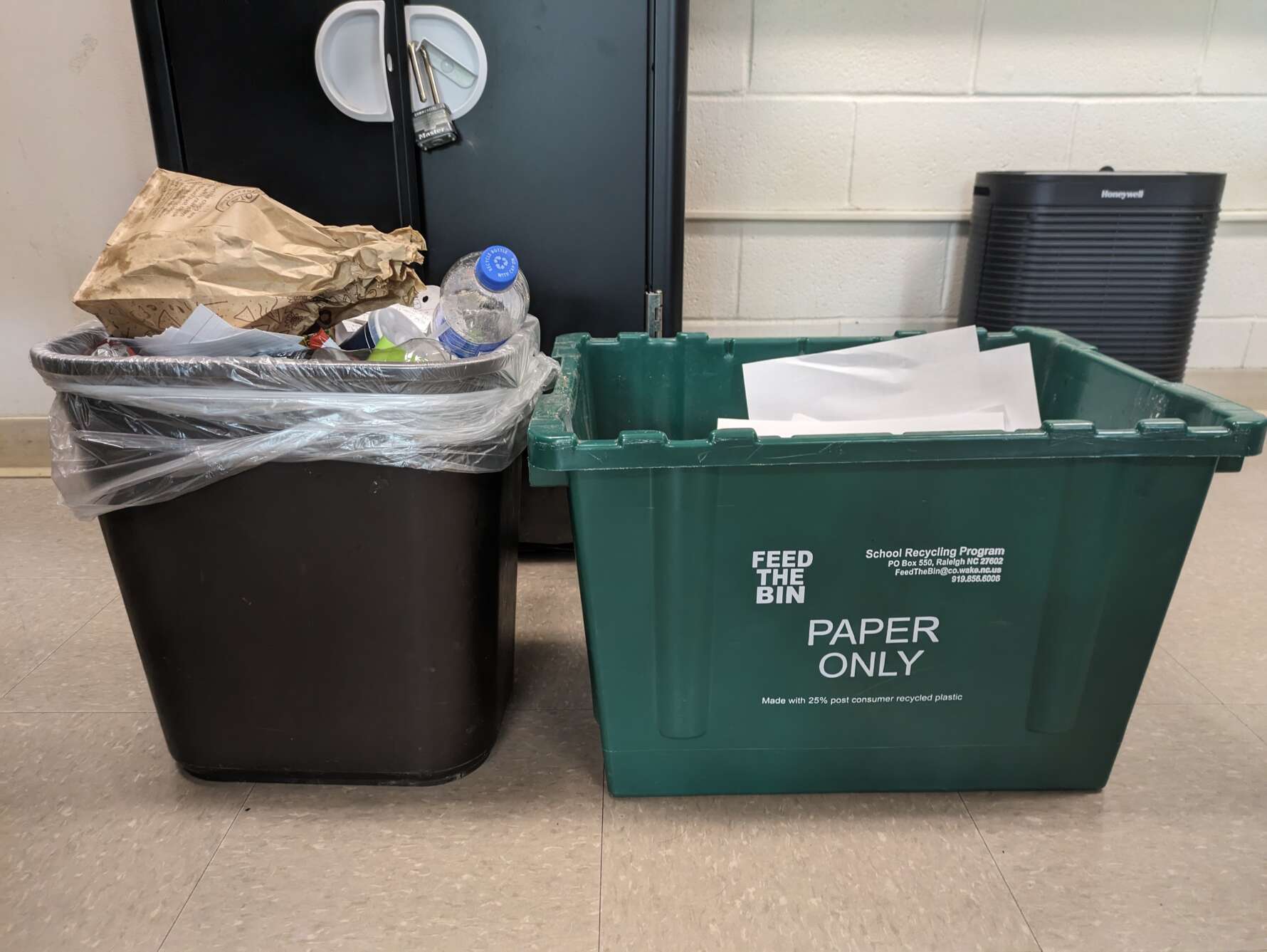 picture of a recycling bin and a trash can