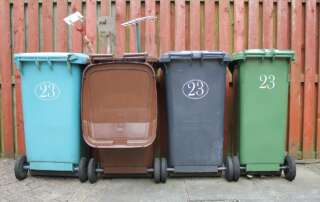 picture of 4 trash cans